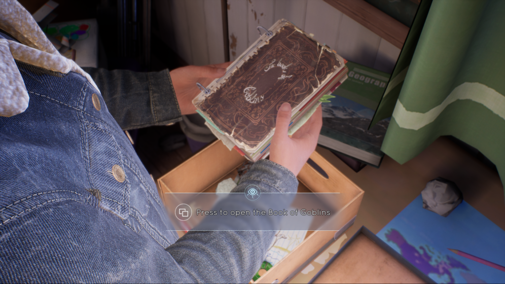 Tyler holding the Book of Goblins.